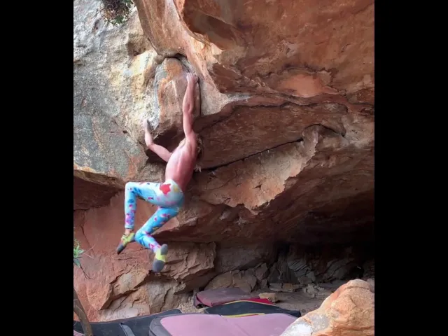 professional rock climber amazingly climbing out of a cave